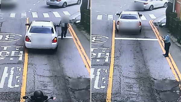 지나가는 차에 손 갖다대 교통사고 합의금 가로챈 60대 구속 송치