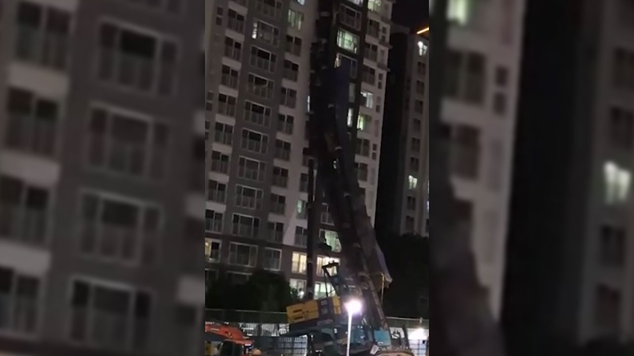 아파트 덮친 천공기 해체 작업 시작