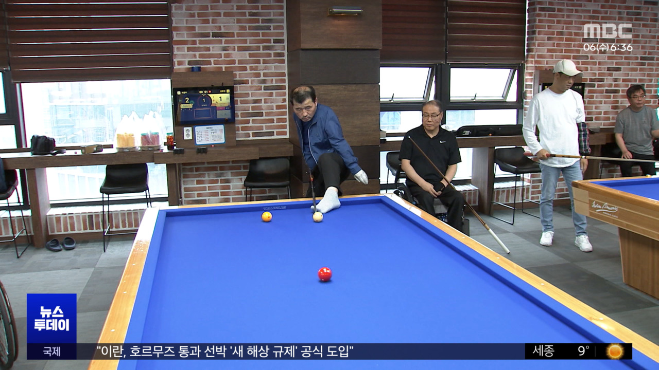 의수로 큐 잡는 당구왕"기술보다 열정"
