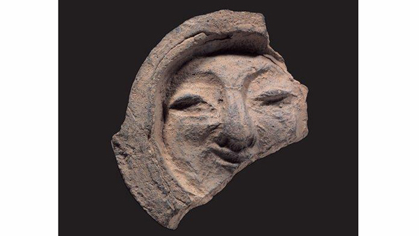 신라 미소 경주 얼굴무늬 수막새 보물 지정