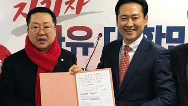 '전두환 재판' 장동혁 전 판사 한국당 입당…