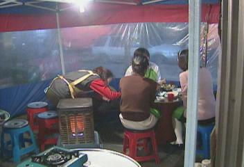 썰렁한 세밑 경기 광우병 조류독감 파동에 울상이진호